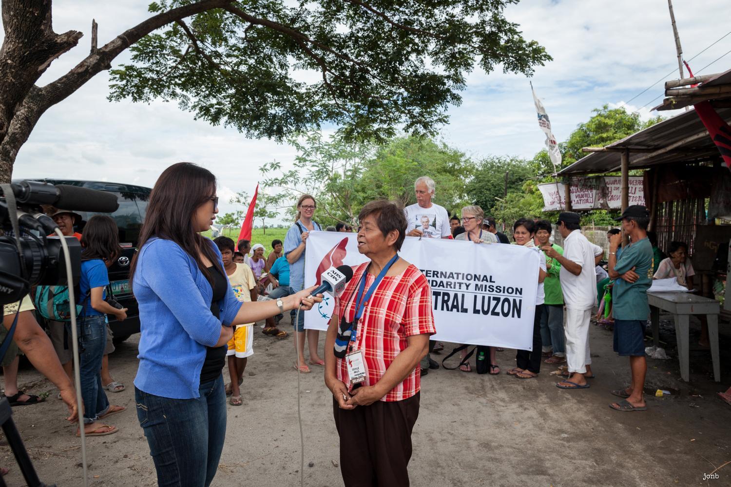 At Hacienda Luisita during an International Solidarity Mission in Central Luzon in 2013